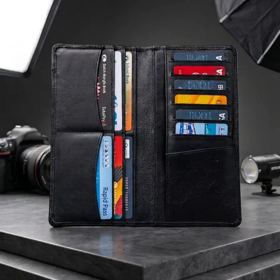 Interior view of William Polo black leather long wallet showing multi card slots and cash compartment